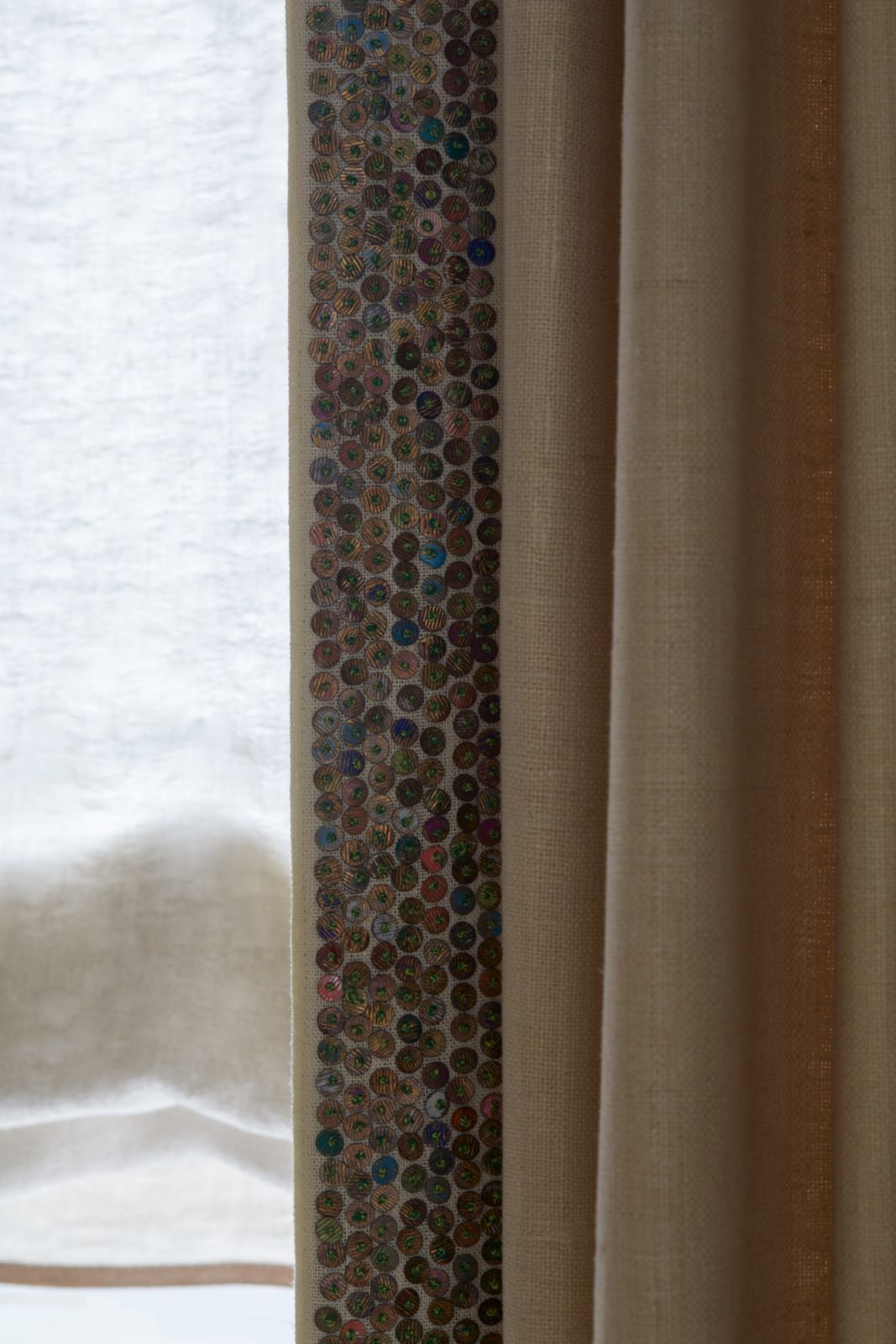Draperies lined with beaded tape in the dining room