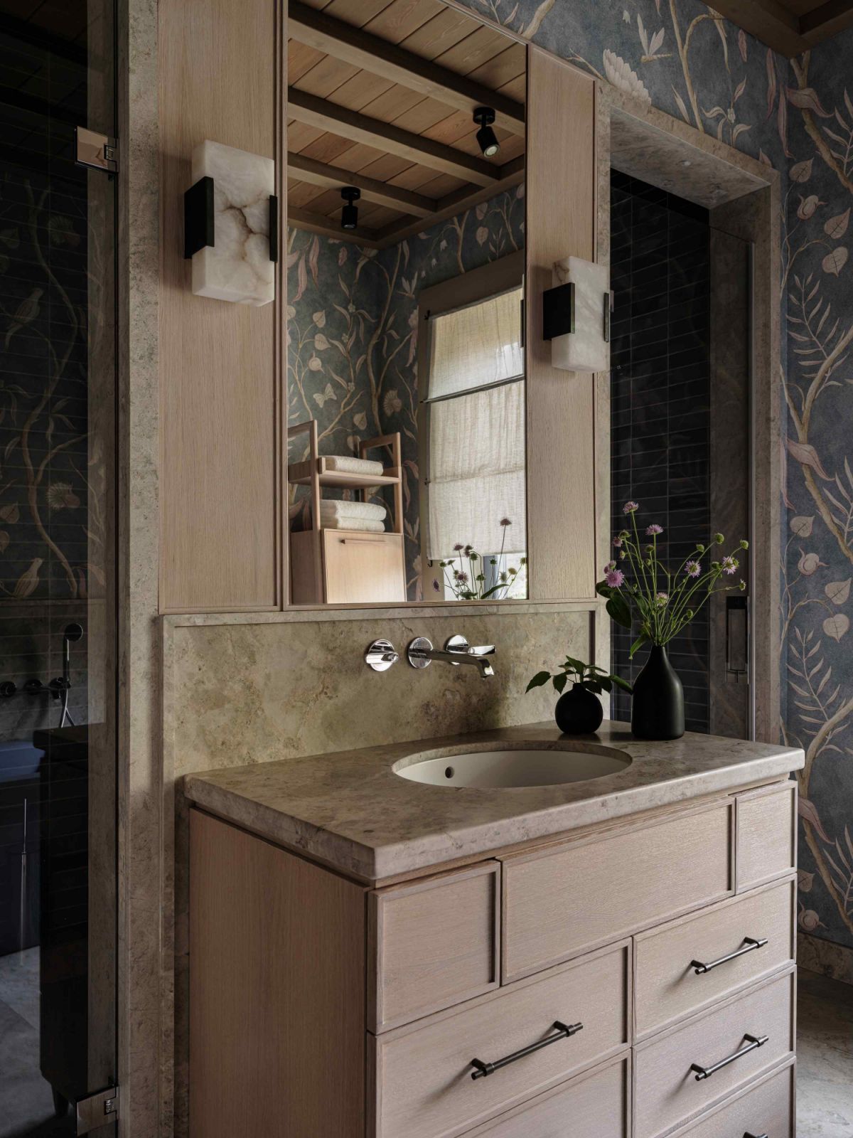 The fittings harmonise with the Angara pine structure