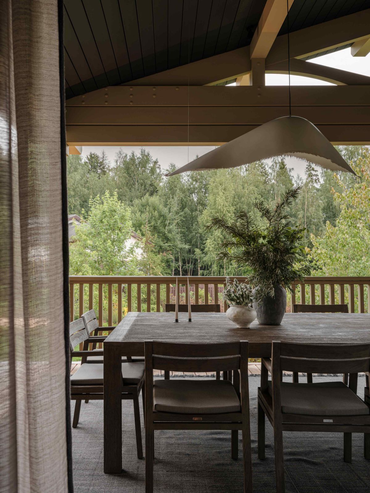 The verandah opens into the landscaped garden