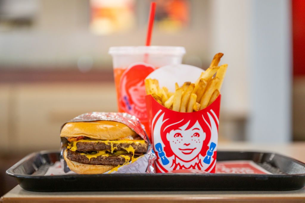 AUSTIN, TEXAS - JUNE 18: In this photo illustration, a Wendy's meal is displayed on a table at a Wendy's restaurant on June 18, 2024 in Austin, Texas. Many fast food restaurants are in the midst of a budget-meal war, offering promotions to lure customers back despite inflation and wage increases.  (Photo by Brandon Bell/Getty Images)