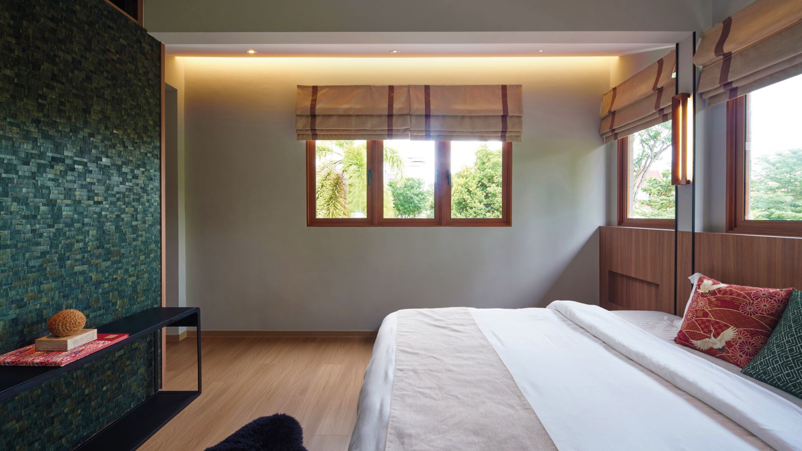 The highlight of the bedroom is the Phillip Jeffries Boho Block wall covering, handcrafted from banana leaves