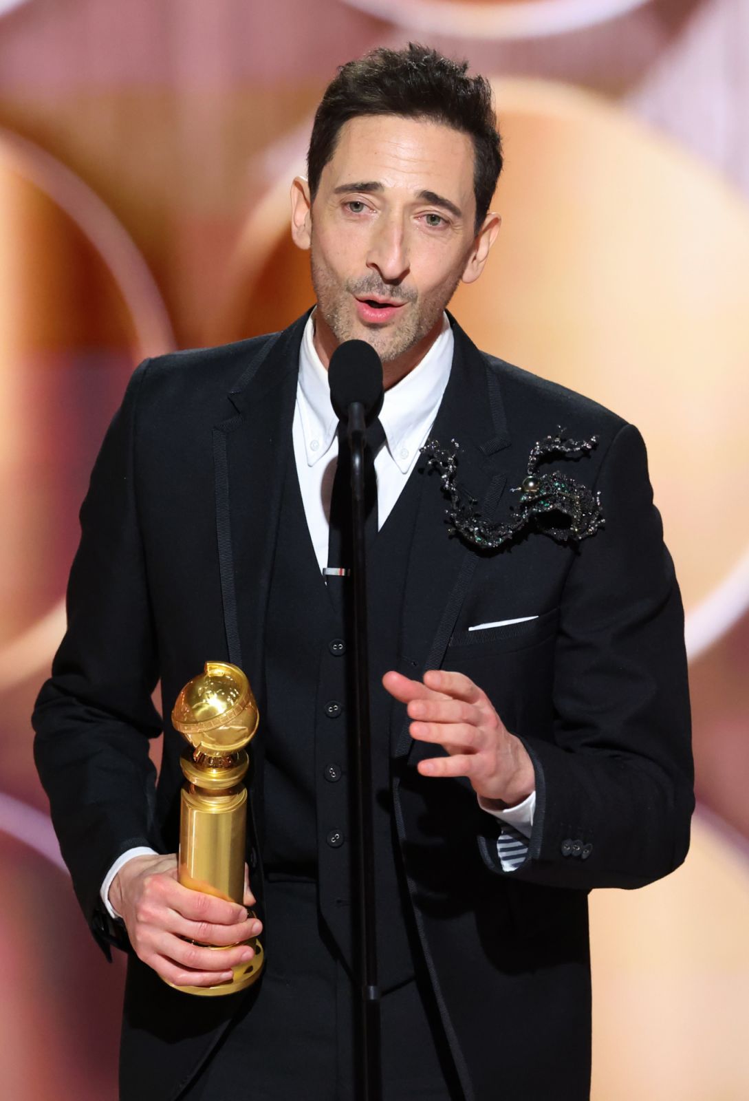 Adrien Brody wins Best Performance by a Male Actor in a Motion Picture Drama for "The Brutalist" during the 82nd Annual Golden Globes held at The Beverly Hilton on January 05, 2025 in Beverly Hills, California. (Photo by Rich Polk/GG2025/Penske Media via Getty Images)