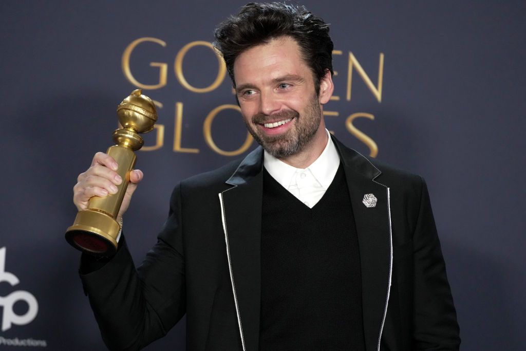Sebastian Stan, winner of Best Performance by a Male Actor in a Motion Picture – Musical or Comedy Award for “A Different Man” poses in the press room at the Golden Globes 2025 (Photo: Getty Images)