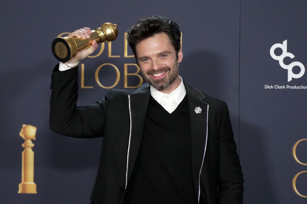 BEVERLY HILLS, CALIFORNIA - JANUARY 05: Sebastian Stan, winner of Best Performance by a Male Actor in a Motion Picture – Musical or Comedy Award for “A Different Man” poses in the press room at the 82nd Annual Golden Globe Awards at The Beverly Hilton on January 05, 2025 in Beverly Hills, California. (Photo by Jeff Kravitz/FilmMagic)