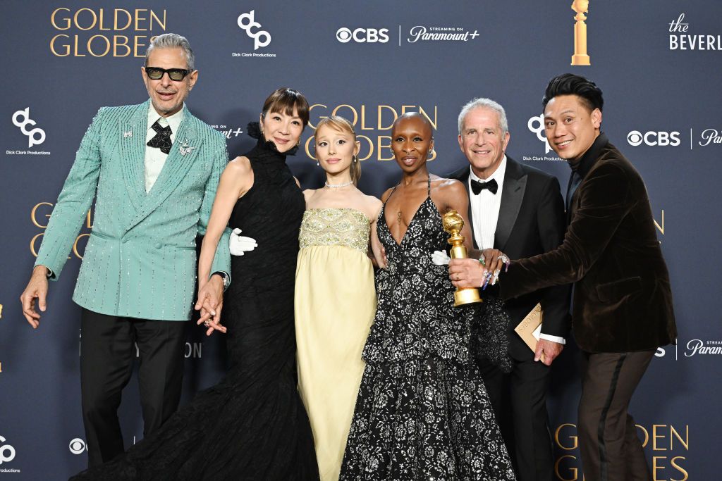 Jeff Goldblum, Michelle Yeoh, Ariana Grande, Cynthia Erivo, Marc E. Platt, Jon M. Chu wins the Cinematic and Box Office Achievement Award for "Wicked" during the 82nd Annual Golden Globes held at The Beverly Hilton on January 05, 2025 in Beverly Hills, California.. (Photo by Gilbert Flores/GG2025/Penske Media via Getty Images)