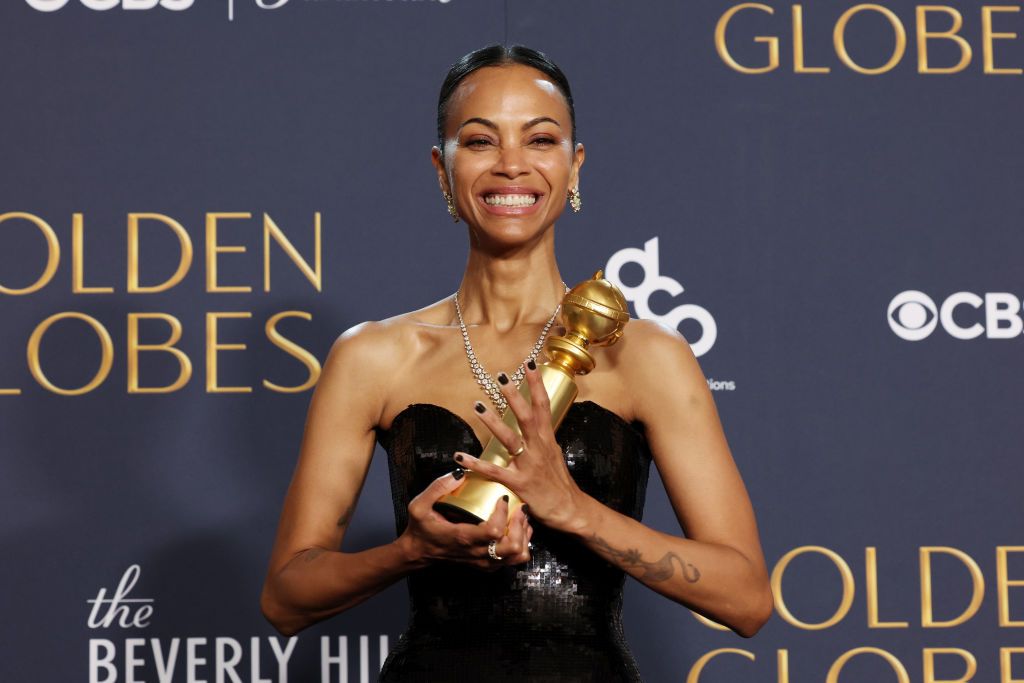BEVERLY HILLS, CALIFORNIA - JANUARY 05: Zoe Saldana, winner of the Best Performance by a Female Actor in a Supporting Role In Any Motion Picture Award for "Emilia Pérez", poses in the press room during the 82nd Annual Golden Globe Awards at The Beverly Hilton on January 05, 2025 in Beverly Hills, California. (Photo by Kevin Mazur/Getty Images)