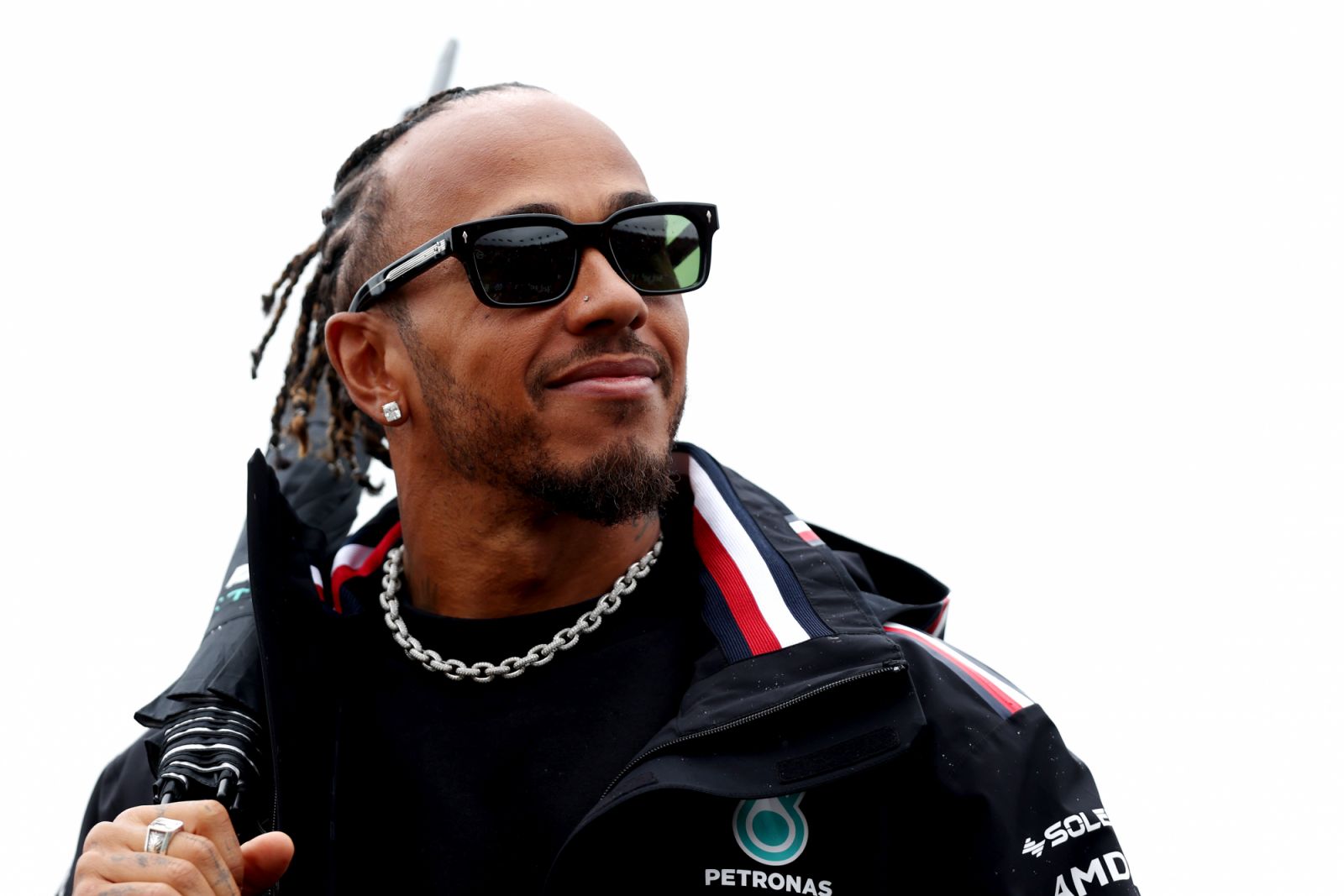 ZANDVOORT, NETHERLANDS - AUGUST 27: Lewis Hamilton of Great Britain and Mercedes looks on from the drivers parade prior to the F1 Grand Prix of The Netherlands at Circuit Zandvoort on August 27, 2023 in Zandvoort, Netherlands. (Photo by Lars Baron/Getty Images)
