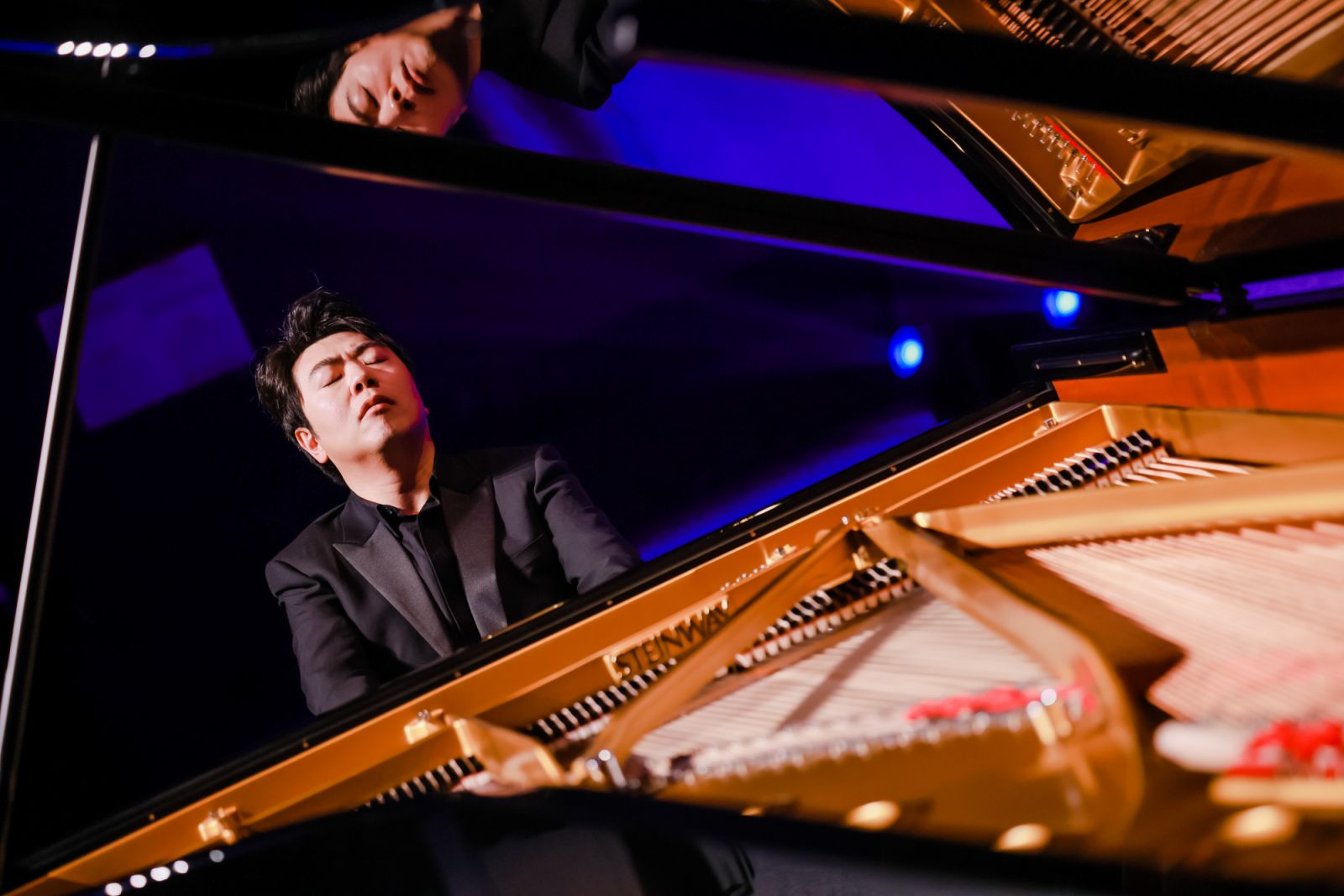 BEIJING, CHINA - OCTOBER 22: Pianist Lang Lang performs during the Steinway & Sons Spiriocast launch event at Beijing Performing Arts Center on October 22, 2024 in Beijing, China. (Photo by VCG/VCG via Getty Images)