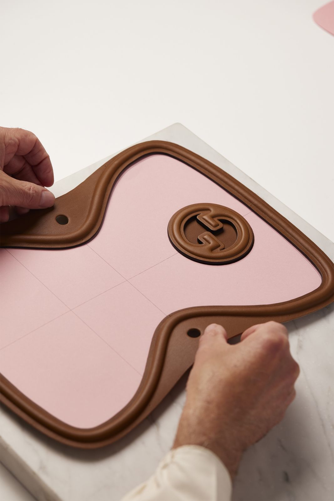 An artisan begins work on the Gucci Blondie bag (Image: Courtesy of Gucci)