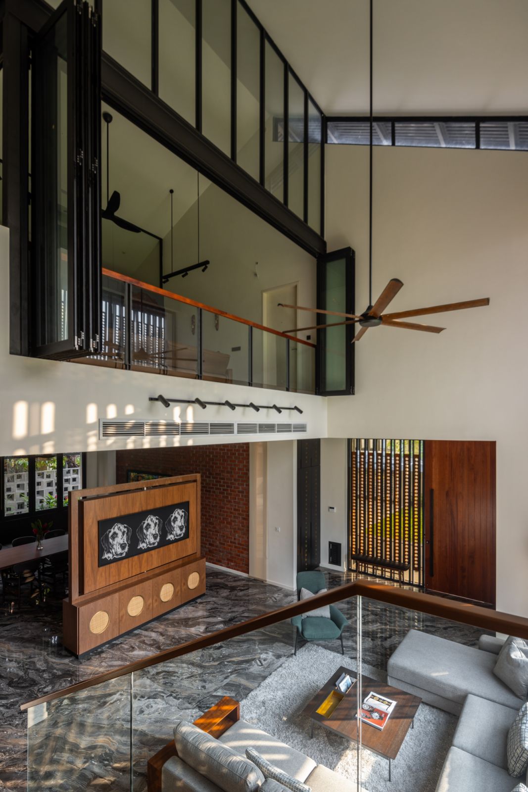 The space showcases the home's impressive gable ceiling height