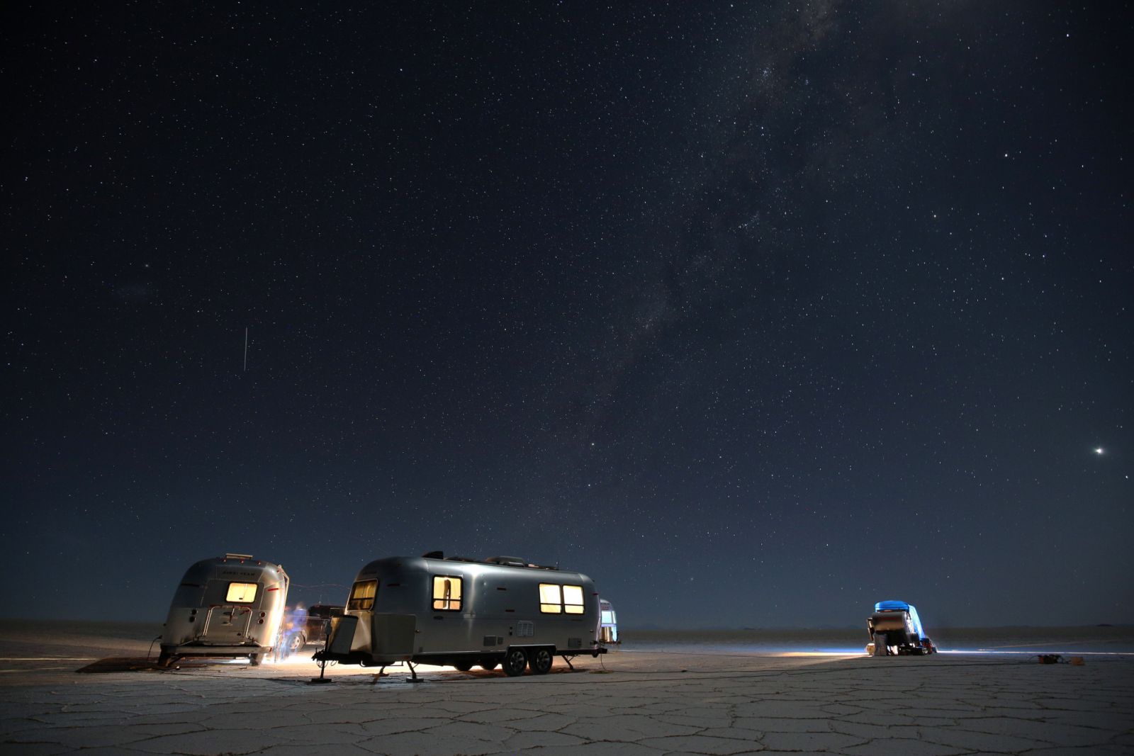 The vast Uyuni Salt Flats of Bolivia underneath the clear, starry skies