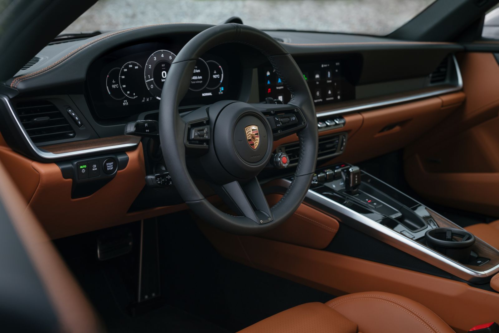 The interior exudes sophistication with standard leather upholstery and a range of customisation options.