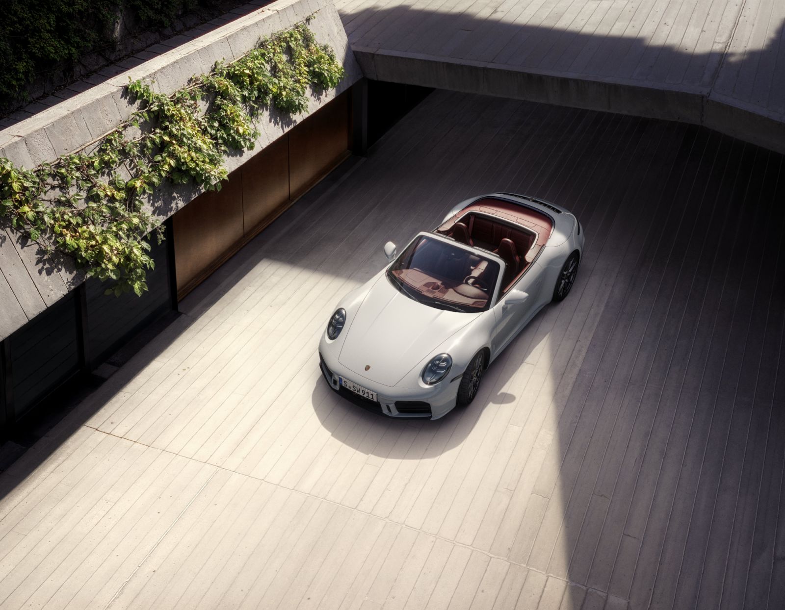 A sports exhaust system with distinctive silver tailpipes and the GTS-inspired red brake calipers elevate the driving experience.