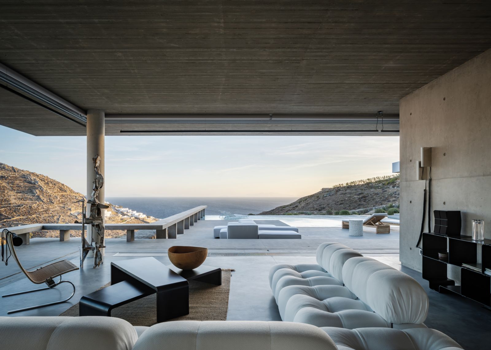 The B&B Italia Camaleonda sofa in the living area is a fluffy counterpoint to the rocky landscape