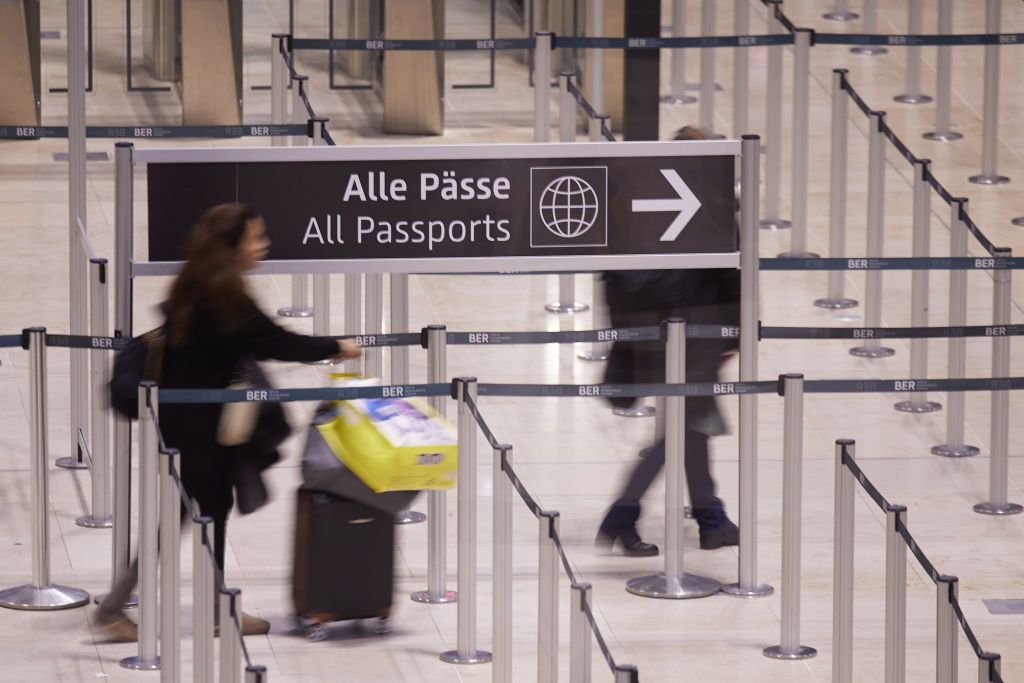 03 January 2025, Brandenburg, Schönefeld: Passengers are on their way to passport control at BER Airport. There are currently said to be technical problems in the security area at German airports. Photo: Joerg Carstensen/dpa (Photo by Jörg Carstensen/picture alliance via Getty Images)