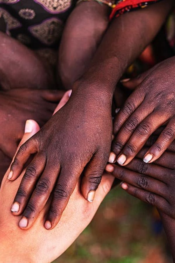 Women in Burkina Faso harvesting shea nuts