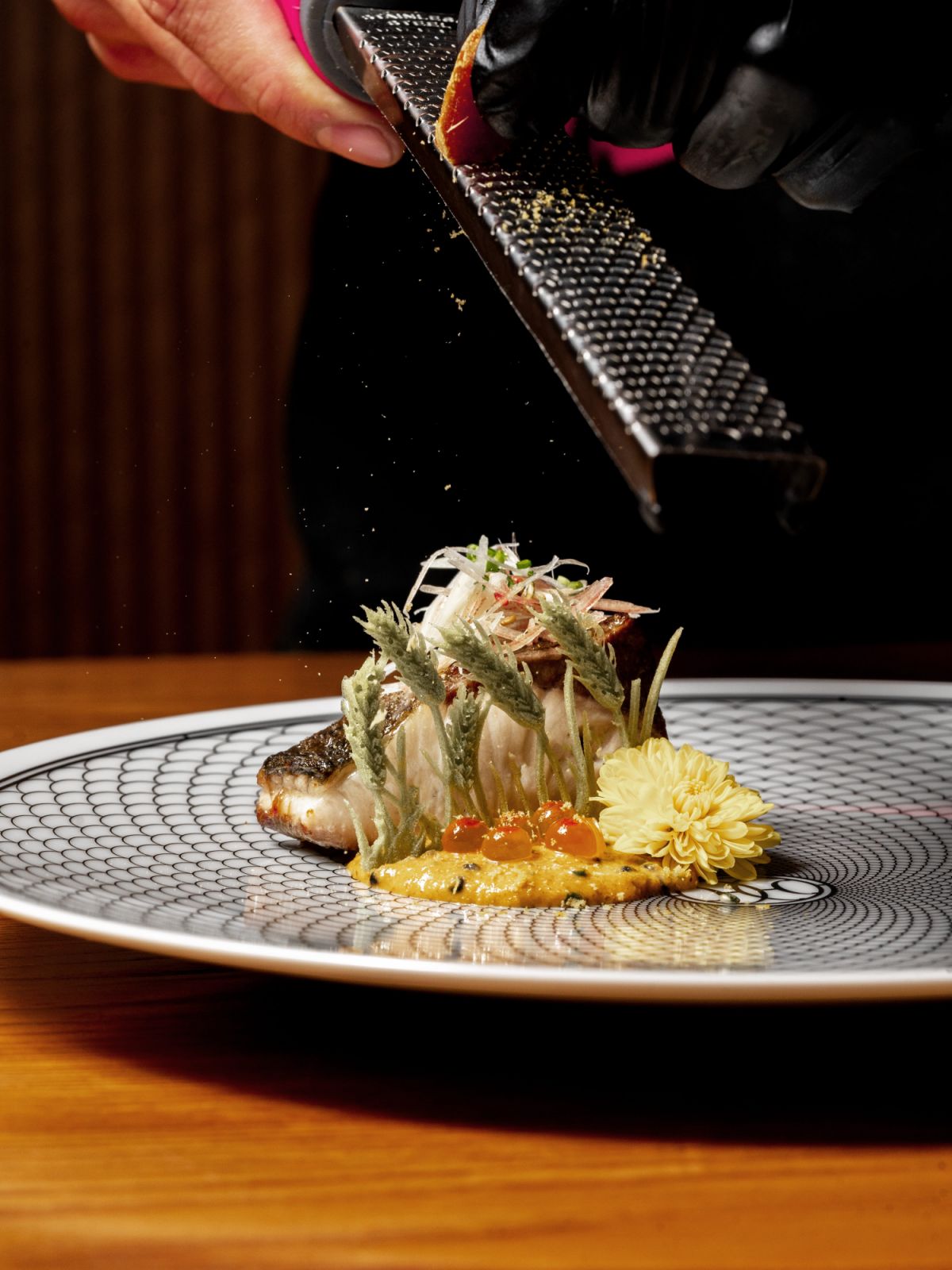 Buri grilled and served with Myoga Bernaise sauce, roasted seaweed and soy sauce tuille and Japanese chrysanthemum
