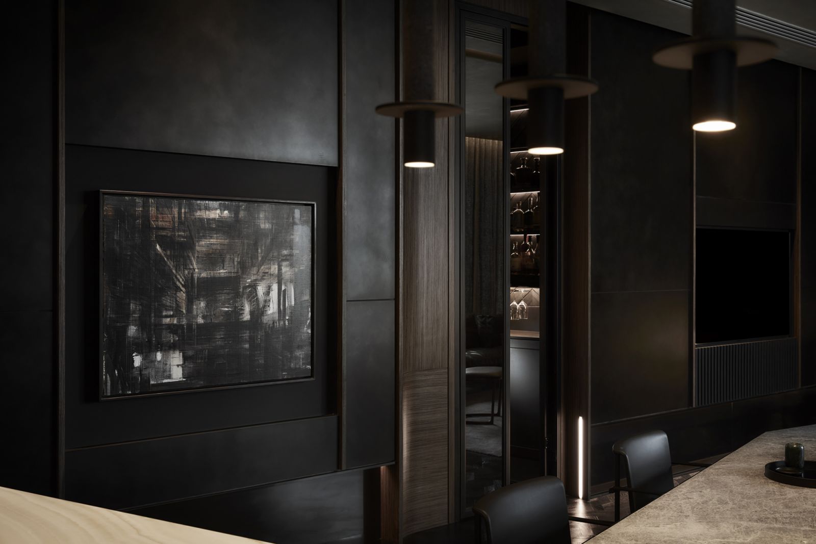 Amid this dark material palette, the TV screen at this Japanese-inspired home only becomes visible when it’s turned on