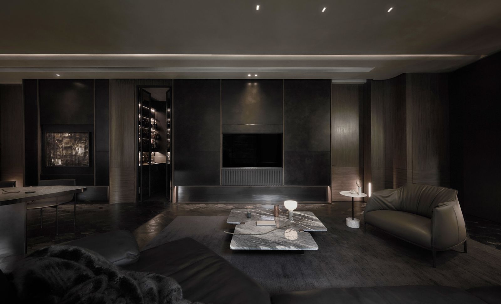 A handsome Poltrona Frau Archibald armchair turns this corner of the Japanese-inspired home into a cosy sitting area