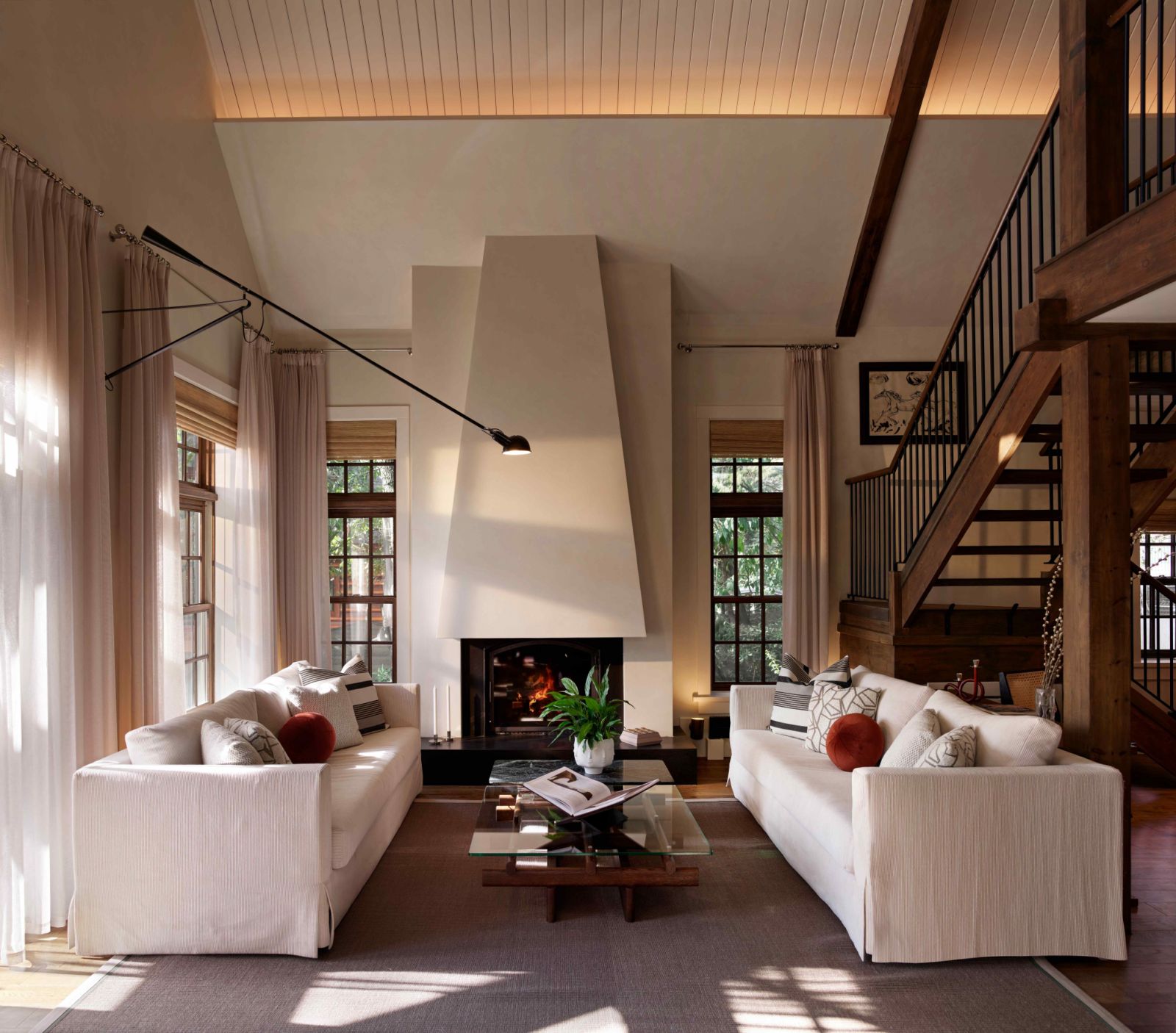 The living room is enriched with elegant touches and various textures