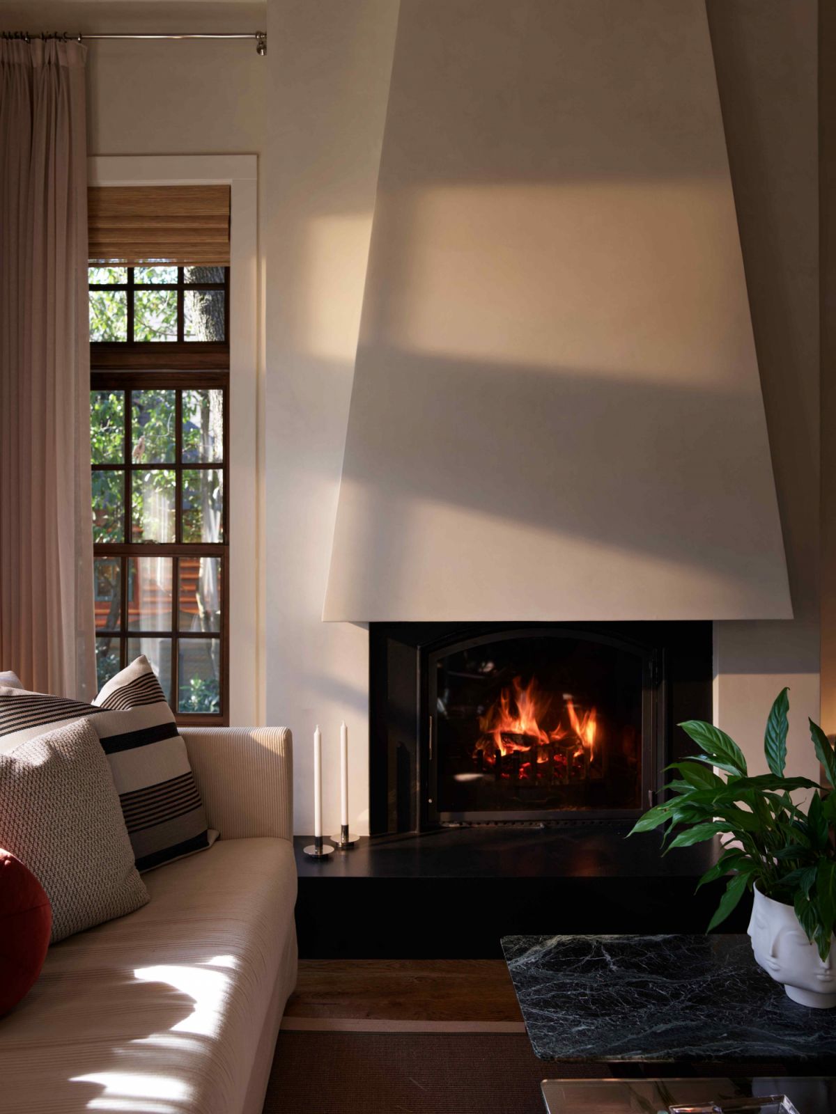The fireplace with a neutral colour palette
