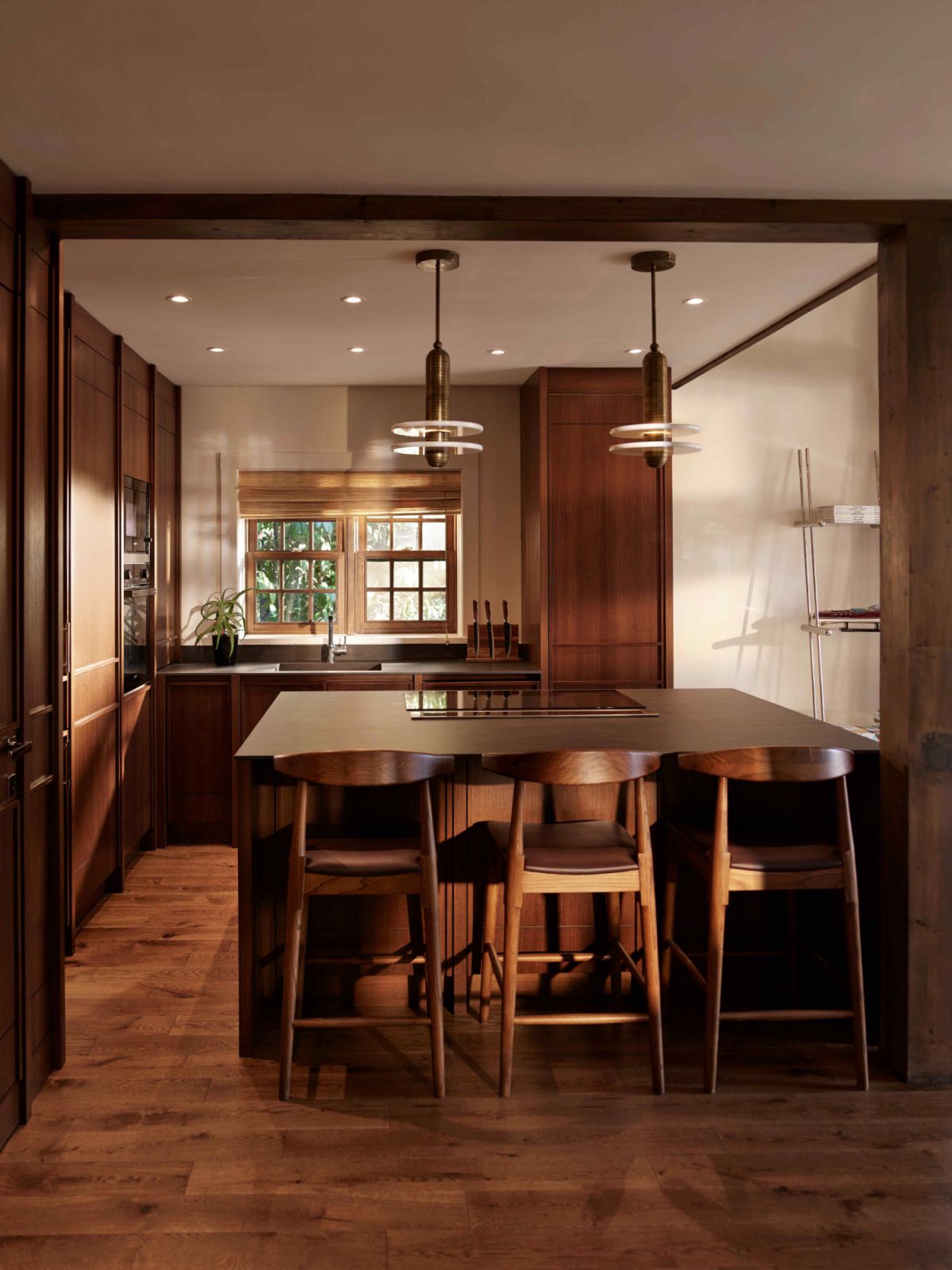 Warm, wood tones anchor the kitchen space
