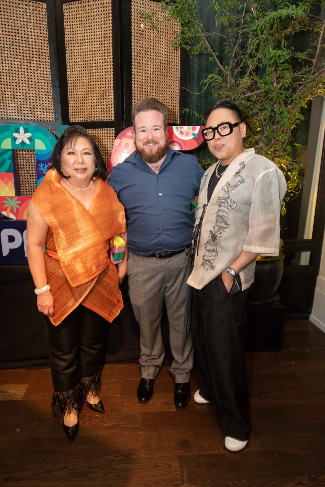 Nico Santos (right) was accompanied by his mother Tita Villanueva and husband Zeke Smith (Photo: Kevin Prudon)