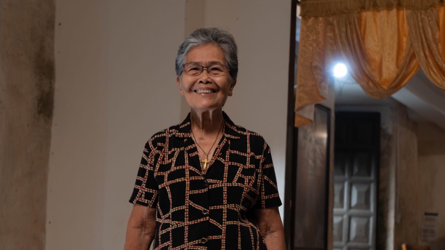 A behind-the-scenes shot of Loboc Children's Choir founder Alma Taldo