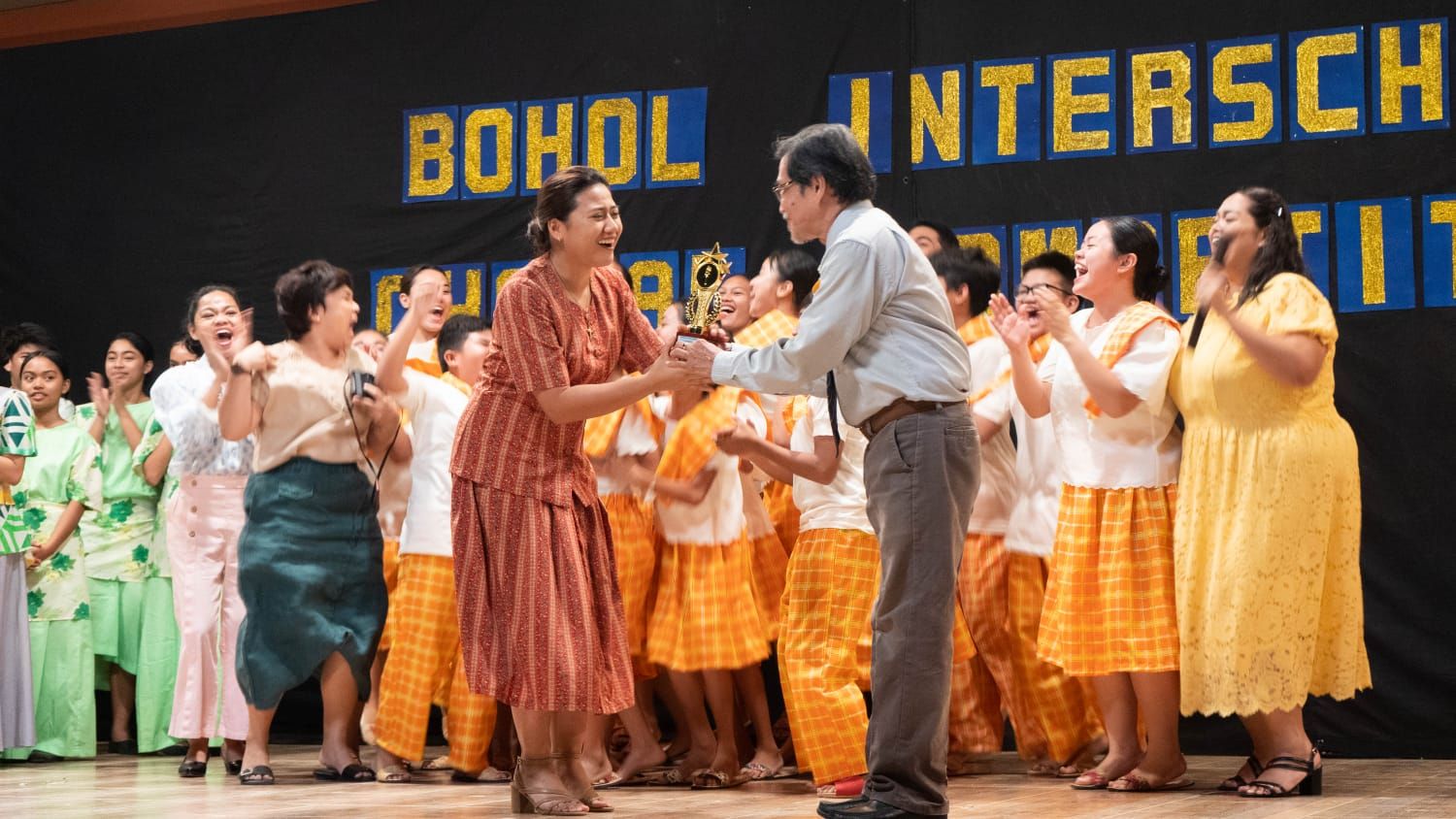 A behind-the-scenes shot from 'Song of the Fireflies' where the Loboc Children's Choir won at the Bohol Interschool Choral Competition
