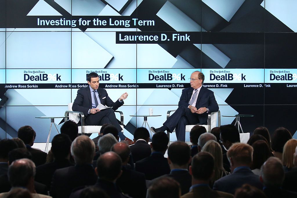 NEW YORK, NY - NOVEMBER 03: New York Times financial columnist Andrew Ross Sorkin (L) participates in a panel discussion with Blackrock CEO Larry Fink at the New York Times 2015 DealBook Conference at the Whitney Museum of American Art on November 3, 2015 in New York City. (Photo by Neilson Barnard/Getty Images for New York Times)
