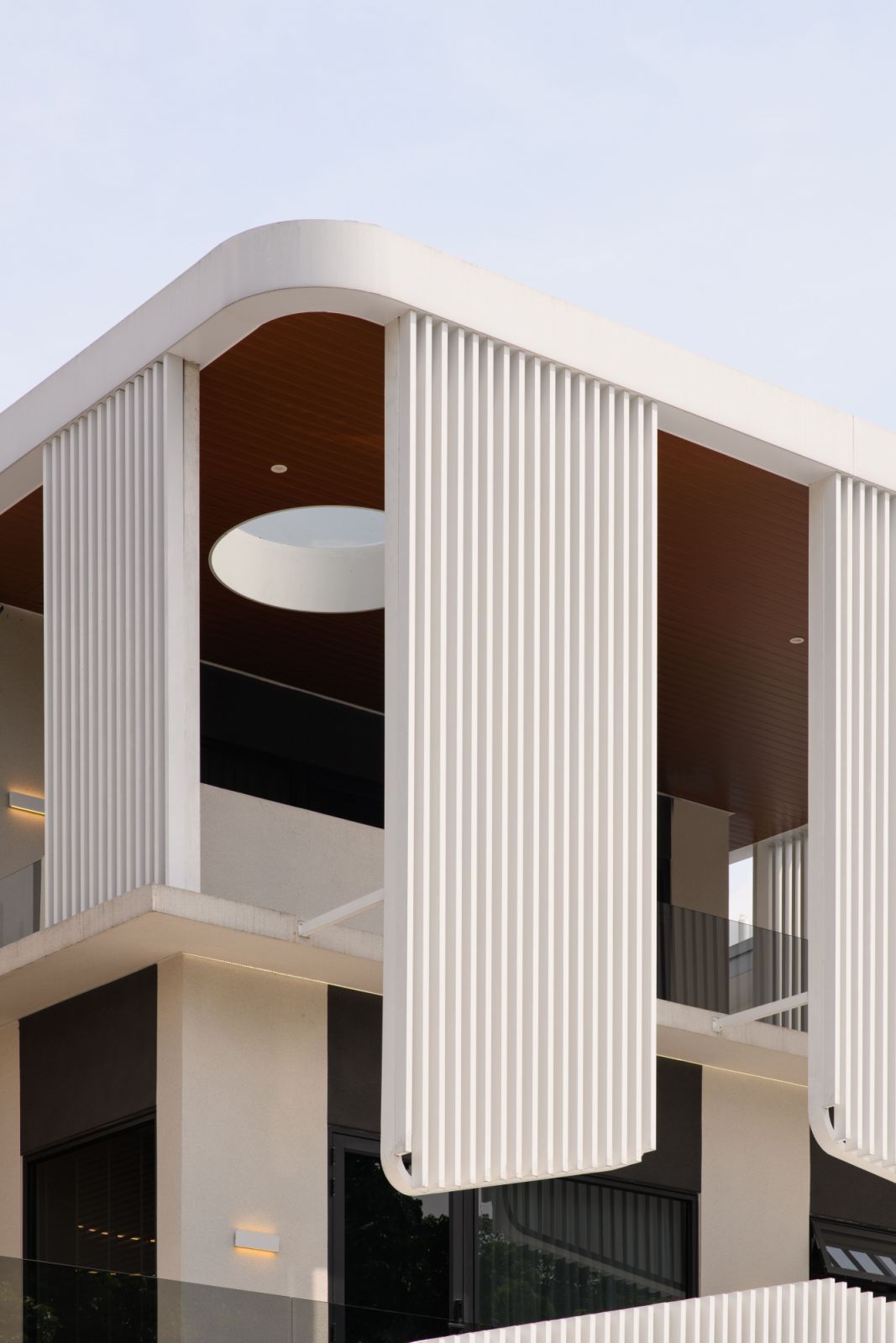 The striking white-striped façade of this Johor Bahru residence ensures privacy from the main road