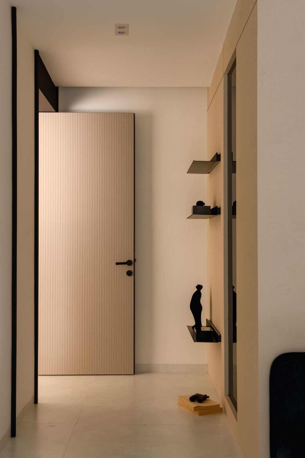 Minimalist floating shelves offer both practical storage and architectural interest