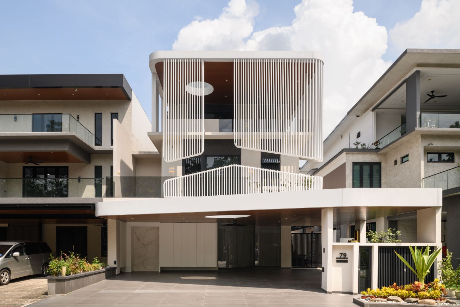 The innovative front screen transforms from a solid barrier to a fabric-like curtain depending on the viewing angle