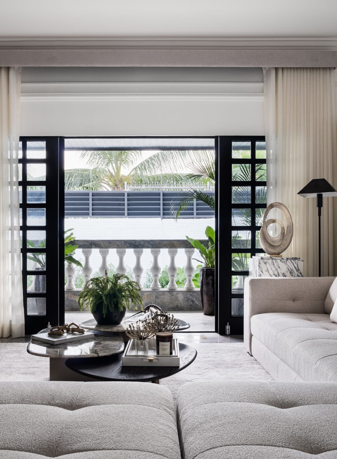 The living room, which balances traditional elements of a Filipino home with contemporary edge