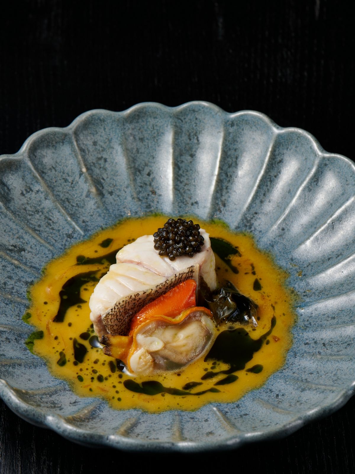 Tiger grouper served with clams and fish roe (photo: Esta Saigon)