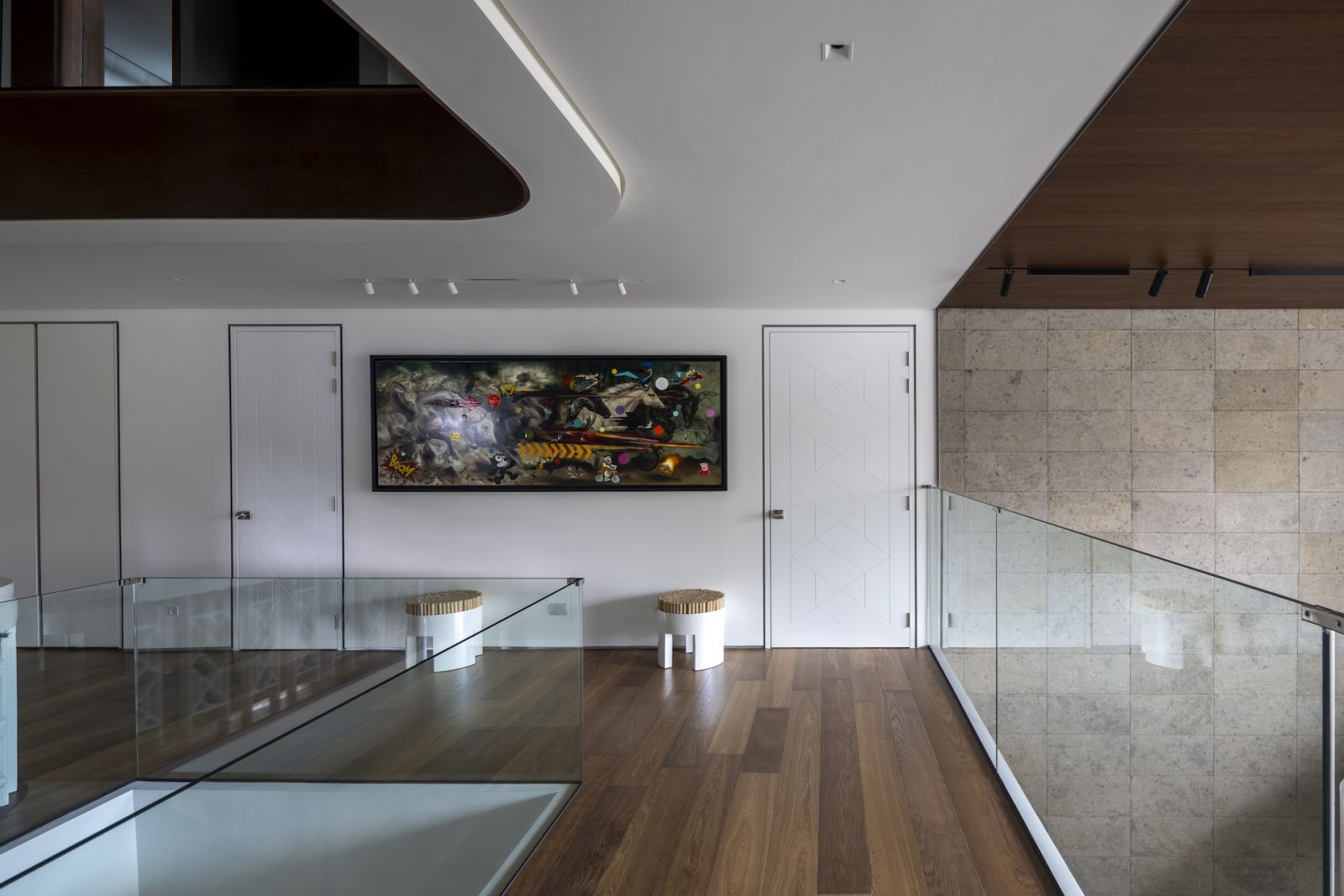 The second-floor bedrooms, featuring doors with intricate details