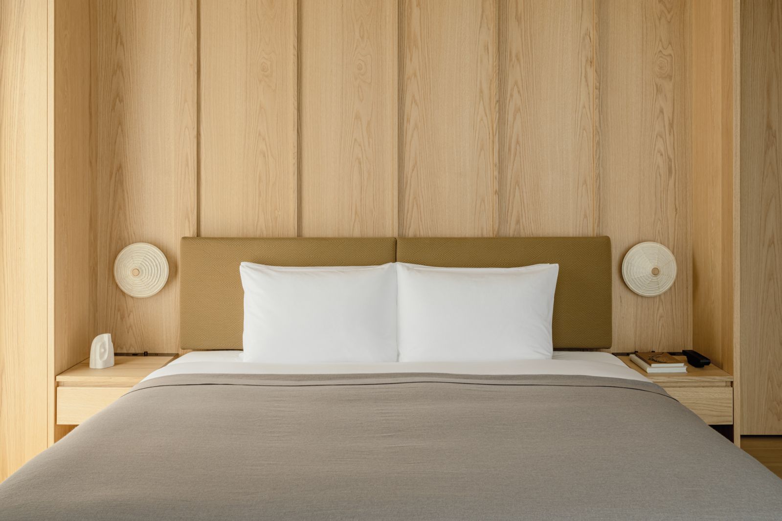 A minimalist guest bedroom at Trunk Hotel Yoyogi Park