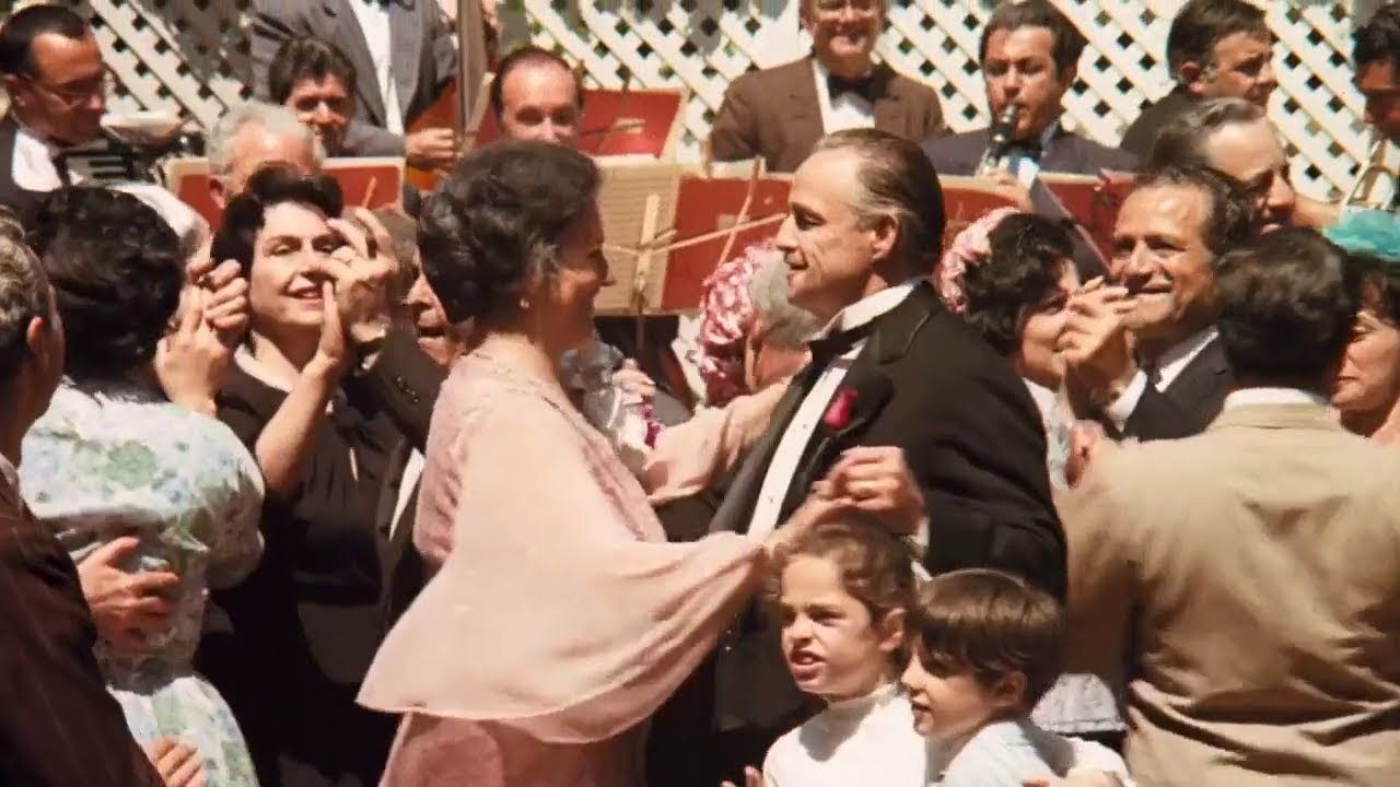 Vito Corleone dancing at a wedding