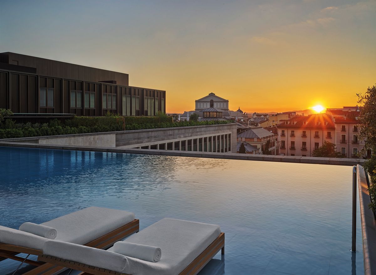 A sunset view from Edition Madrid's rooftop pool