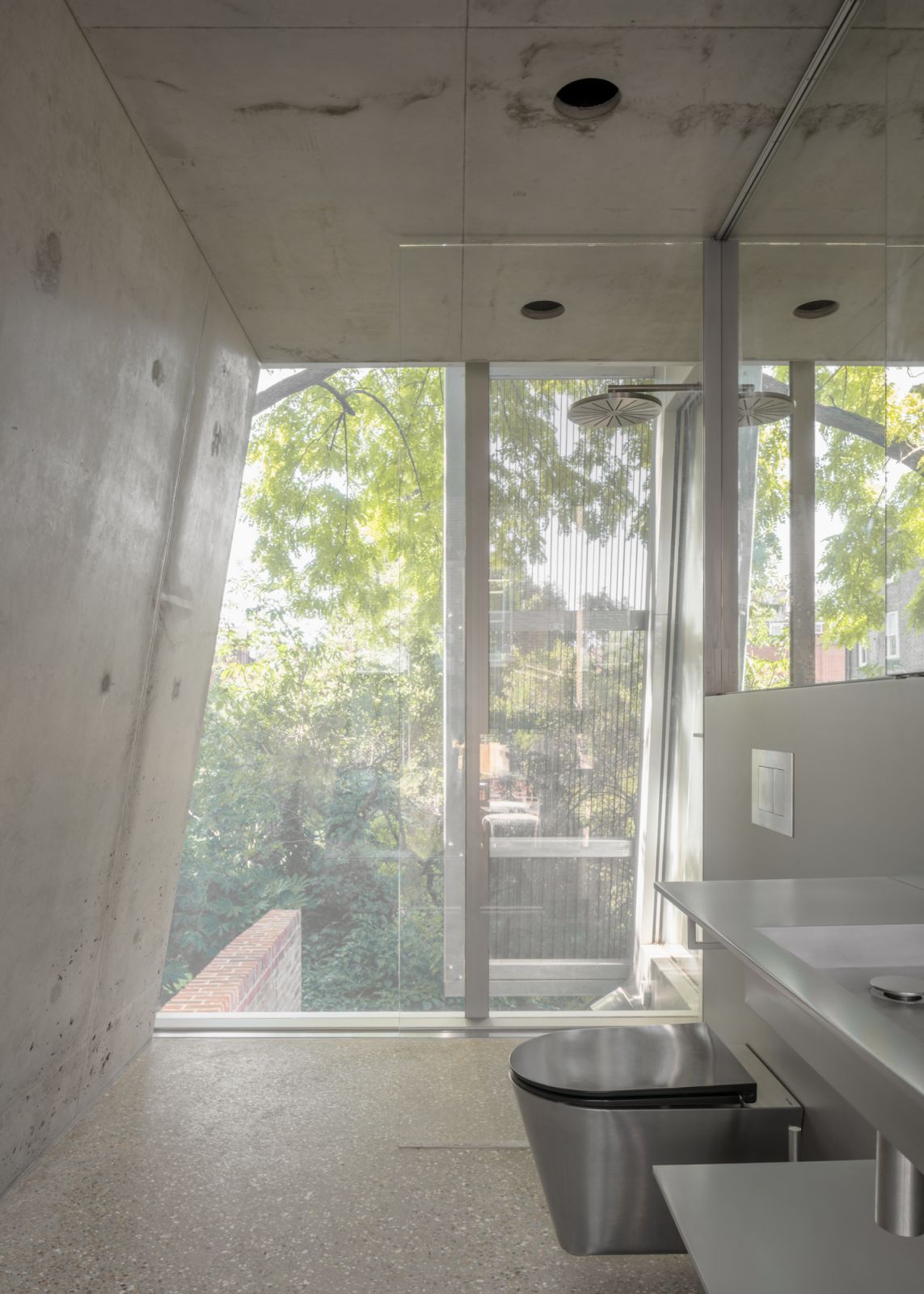 The home’s brutalist bathroom