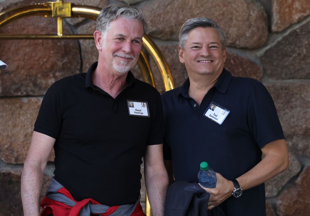 Netflix founder Reed Hastings (left) and Ted Sarandos (right) photographed together in 2021 (Photo by Kevin Dietsch/Getty Images)