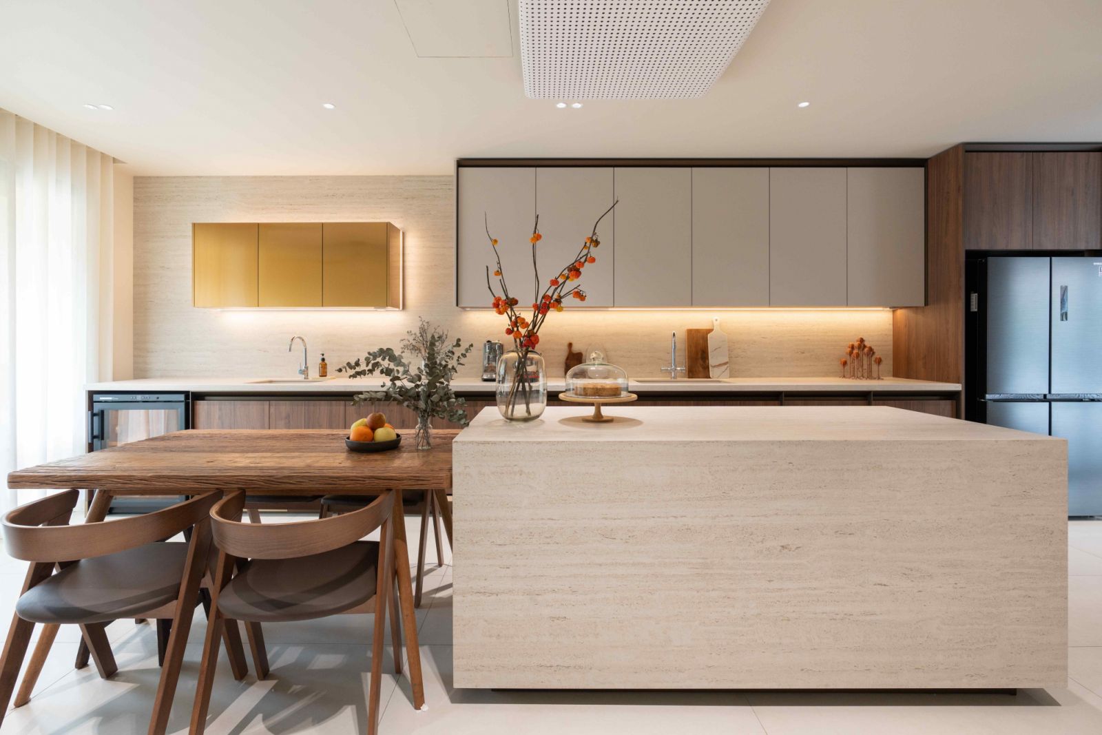 Dark wood materials add depth and character, while travertine-like texture provide a sleek, linear design