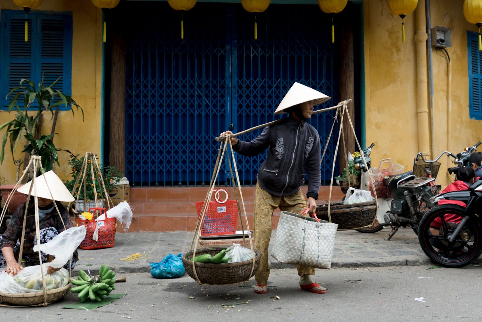 Street vendors in Hoi An, Vietnam (Photo by Alvin Ng Zi Hao/SOPA Images/LightRocket via Getty Images)