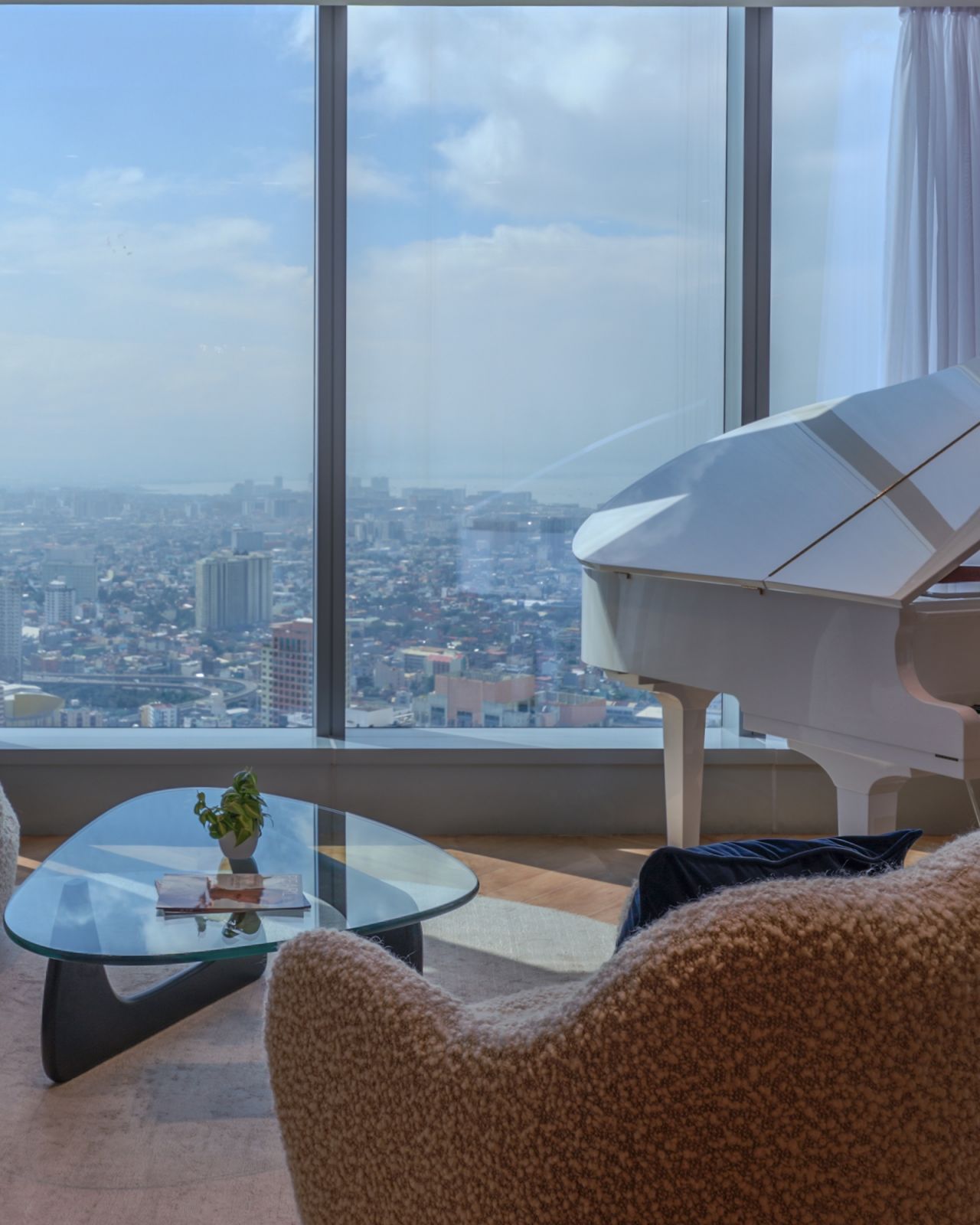 Maison Jewelmer’s lounge space with panoramic views of Metro Manila (Photo: Courtesy of Jewelmer)