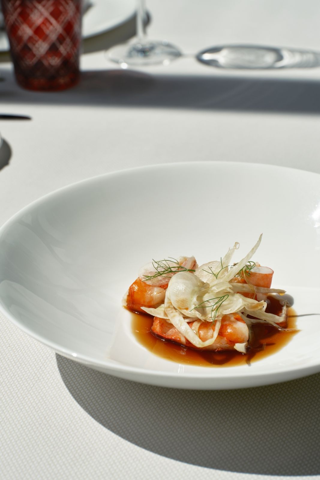 Pan-fried king prawn, candied fennel, black garlic Martell VSOP broth by Finestra | Photo by JV Rabano