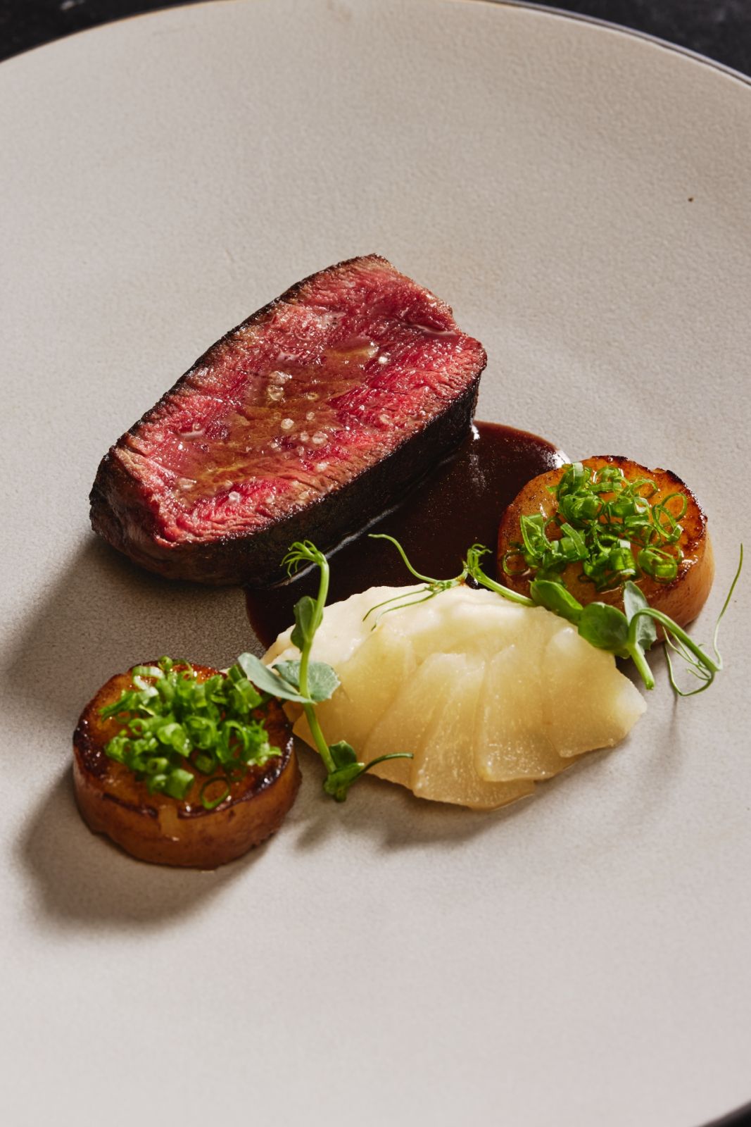 Tenderloin with Martell VSOP demi-glace, celeriac purée, potato fondant, confit pear by Cantabria | Photo by JV Rabano