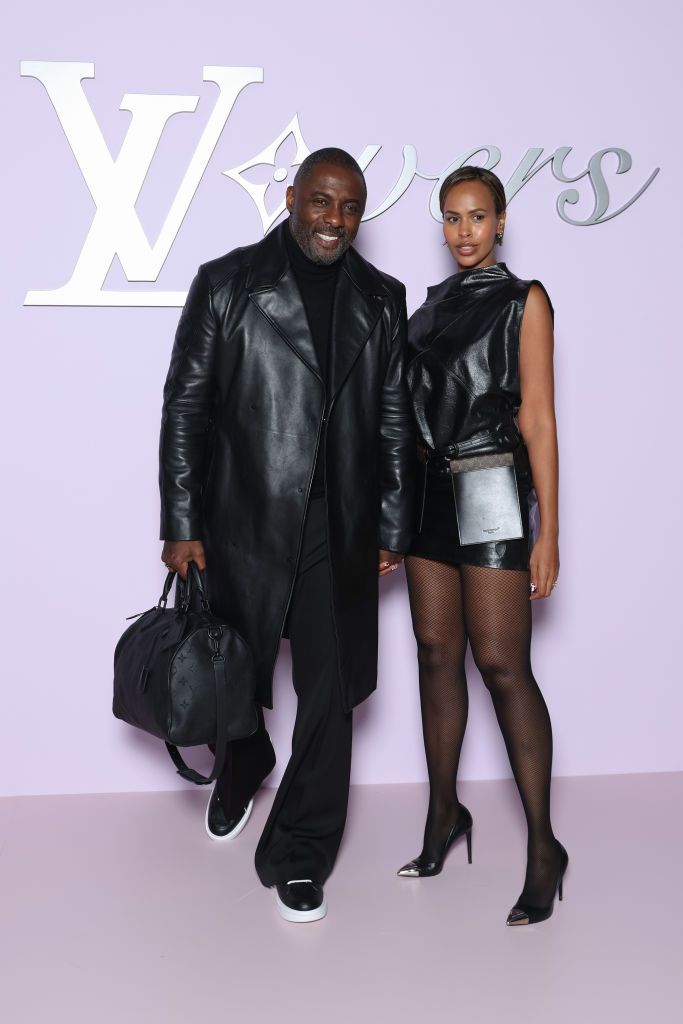 PARIS, FRANCE - JANUARY 21: (EDITORIAL USE ONLY - For Non-Editorial use please seek approval from Fashion House) Idris Elba and Sabrina Dhowre Elba attend the Louis Vuitton Menswear Fall-Winter 2025/2026 show as part of Paris Fashion Week on January 21, 2025 in Paris, France. (Photo by Pascal Le Segretain/Getty Images)