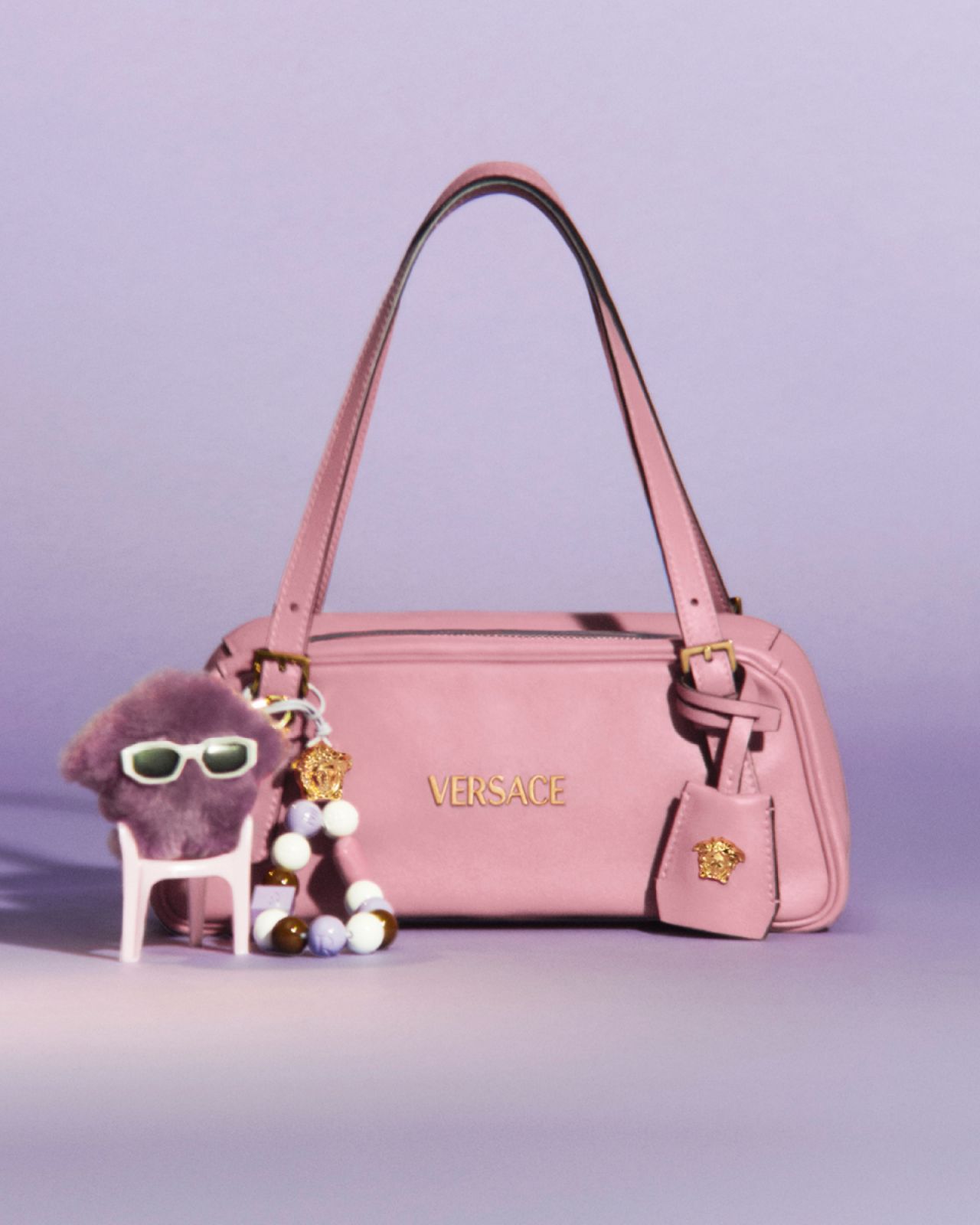 The Versace Tag Bag in English Rose with the Medusa Fluffy charm (Photo: Versace)
