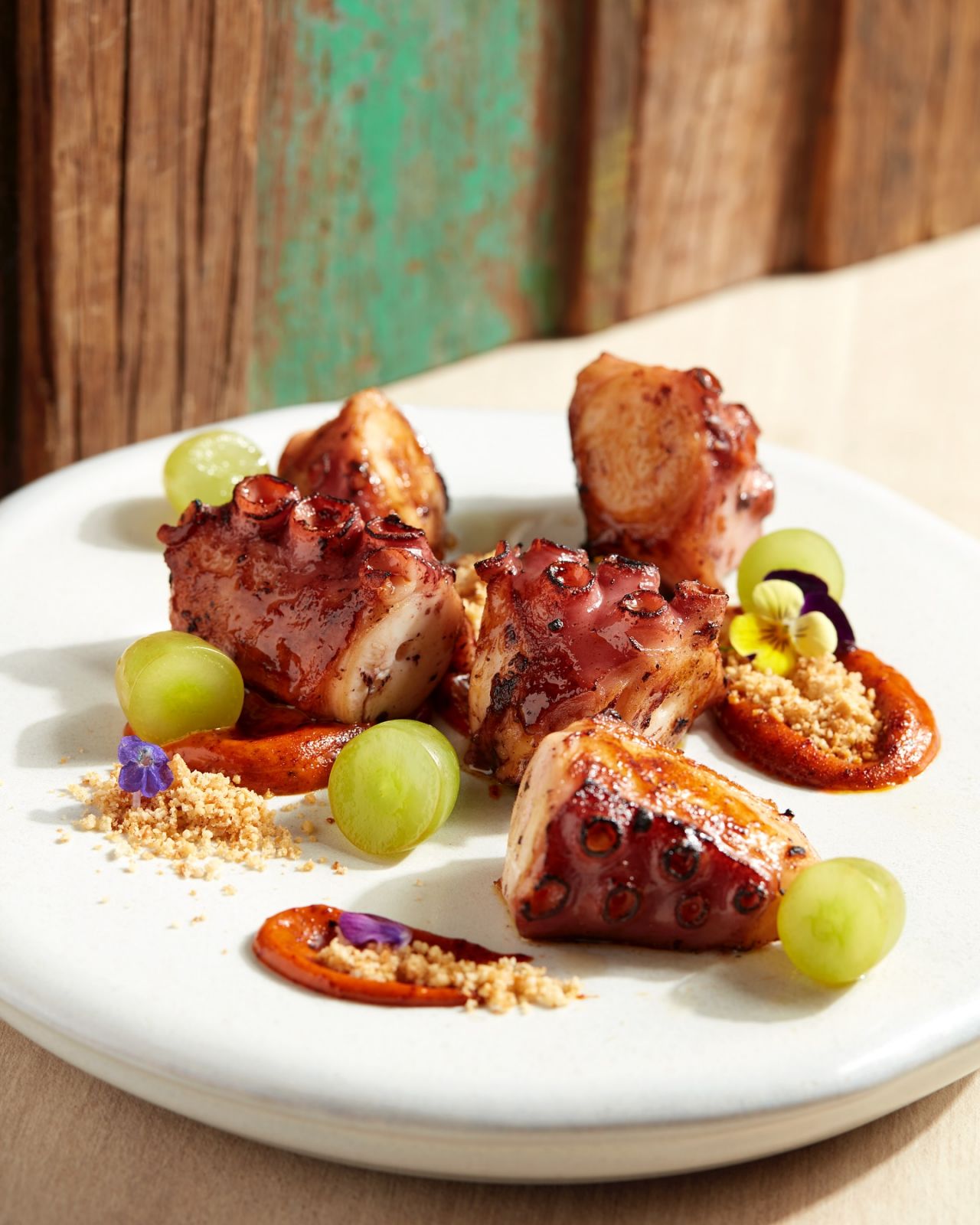 Grilled octopus with chipotle mayo and grapes (Photo: Facebook/ Vino Tinto)