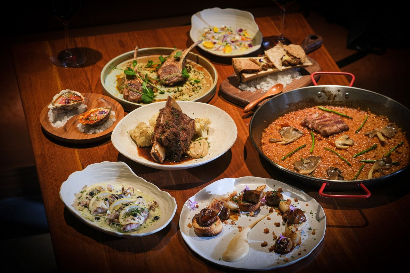 Table spread at Nómada, one of the new restaurants to try in February (Photo: Nómada)